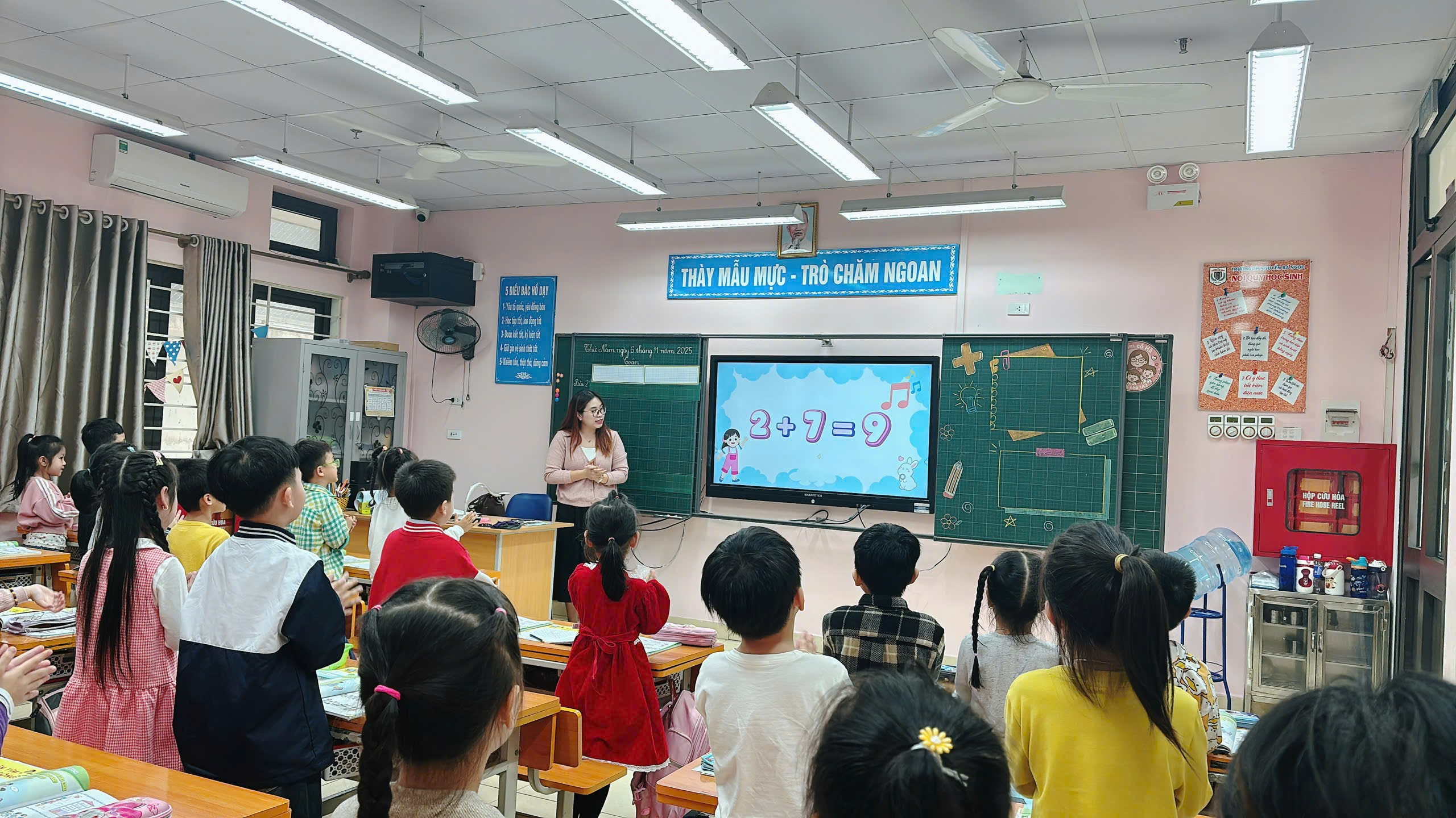 A group of children in a classroom
AI-generated content may be incorrect.